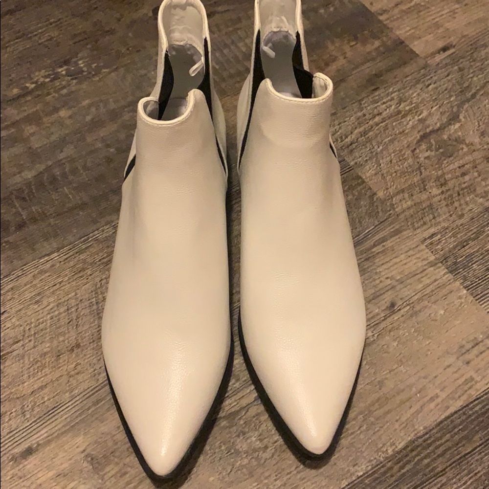 White and black pointed booties